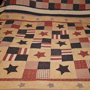 Patchwork Star Quilt in Red, Blue, and Tan